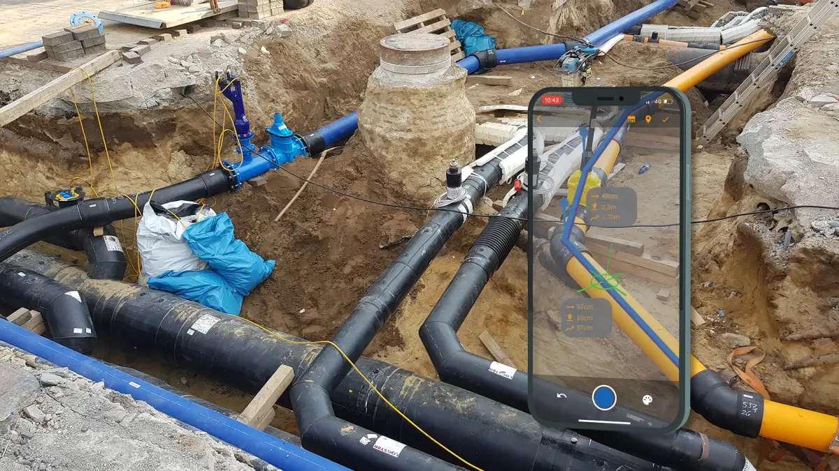 Veranschaulichung der Erfassung von Schweißdaten auf der Baustelle. Erfassung am offenen Baugraben mit dem Smartphone.